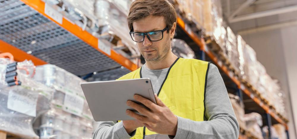 man with tablet working logistic